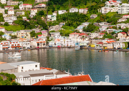 Overview above St. George's Harbor surrouned by colorful buildings, Grenada Stock Photo