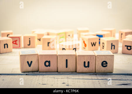 Word 'Value ' wood Cubic on the wood Stock Photo