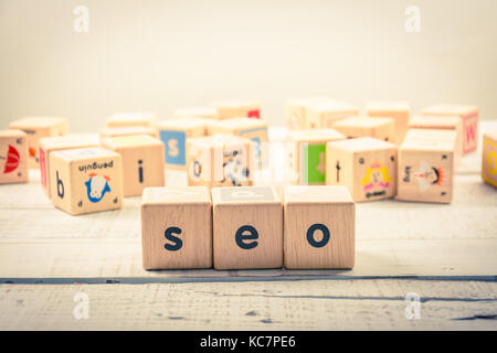 Word ' SEO' wood Cubic on the wood Stock Photo