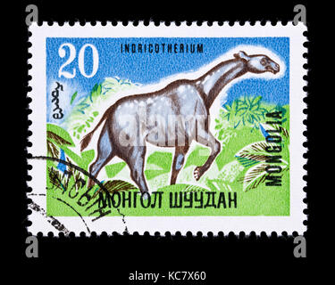 Postage stamp from Mongolia depicting an indricotherium Stock Photo