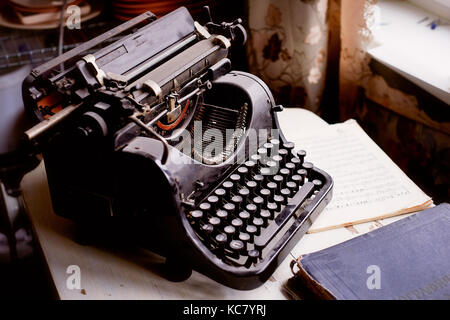 Old metal typewriter, covered in dust and rust.Retro Stock Photo