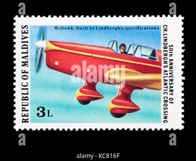 Postage stamp from the Maldive Islands depicting a Mohawk airplane Stock Photo