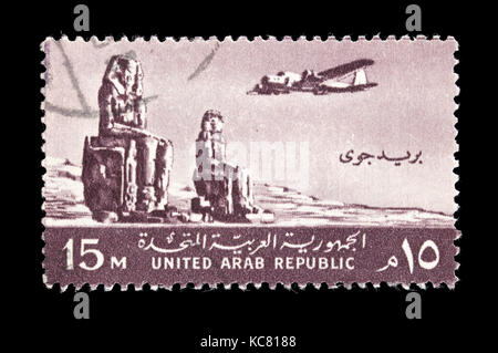 Airmail postage stamp from Egypt (United Arab  Republic) depicting the Colossi of Memnon at Thebes. Stock Photo