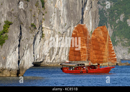 CAT BA, VIETNAM, October 27, 2016 : Traditional junk sails in Cat Ba Archipelago, the southeastern edge of Ha Long Bay. Ha Long Bay has been inscribed Stock Photo