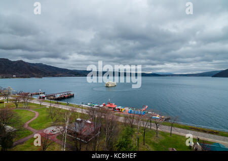 Cloudy view of the infamous Lake Toya. The lake is a volcanic caldera lake in Shikotsu-Toya National Park, located in Hokkaidō, Japan.