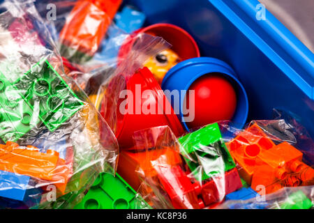 Tambov, Russian Federation - August 21, 2011 New Lego Duplo Education set with blocks, bricks, toys and ball in blue box. Close-up. Studio shot. Stock Photo