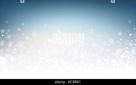 Snowflakes and snow powder on a frozen blue background - Winter material Stock Photo
