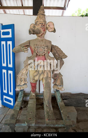 Wooden antique cultural figures courtyard cafe in Barefoot shop, Colombo, Sri Lanka, Asia Stock Photo