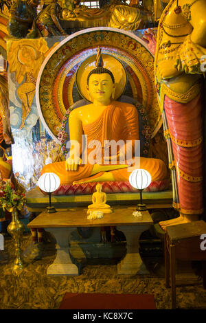 Large Buddha statue Gangaramaya Buddhist Temple, Colombo, Sri Lanka, Asia Stock Photo