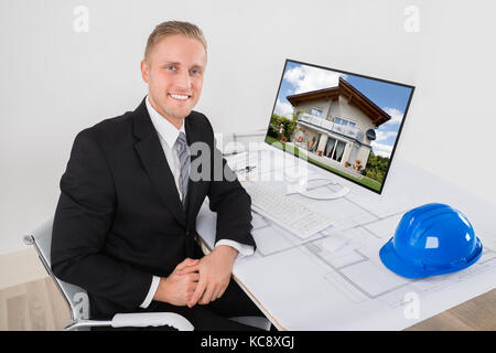 Young Happy Architect Smiling At Work In Office. Stock Photo