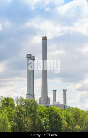 Main cause of environmental pollution to atmosphere is industrial emissions from plant chimney