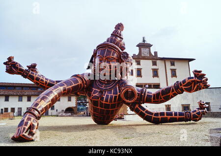 The sculpture entitled Three Heads Six Arms by Chinese artist Zhang Huan located in Forte di Belvedere Florence Italy Stock Photo