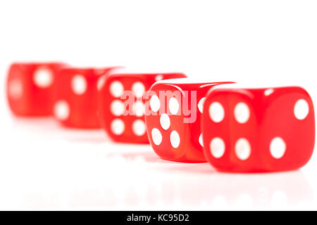 Red Casino Dice Row Focus on Five Isolated on White Bckground Stock Photo