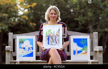 Auctioneer Catherine Southon holds examples from the Smilby cartoon collection, including works that appeared in Playboy, at the Ripley Arts Centre, Bromley, ahead of their auction next month. Stock Photo