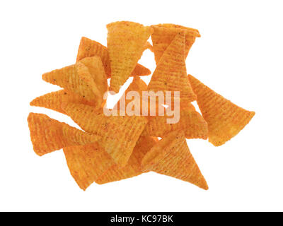 Top view of a small pile of cheese flavored cone shaped corn chips isolated on a white background. Stock Photo