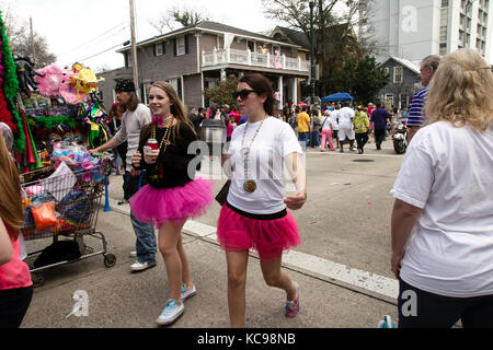 Baton Rouge, Louisiana, USA - 2016: People watch a parade during Mardi Gras celebrations. Stock Photo