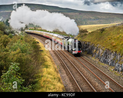 Tornado Steam Locomotive Hauling the Border Raider after departure from Ribblehead Station Yorkshire Dales England