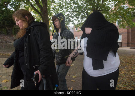 Kati Ringer (face obscured) leaves Norwich Magistrates' Court where she appeared for sentencing. Stock Photo