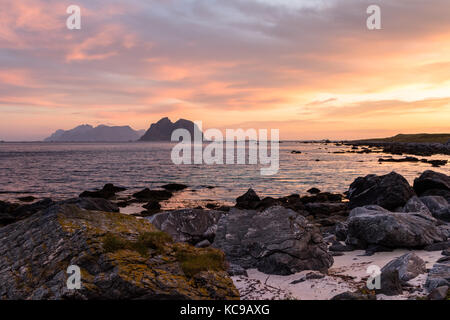 Scenic cloudscape with sunrise over the Lofoten islands in Norway in summer Stock Photo