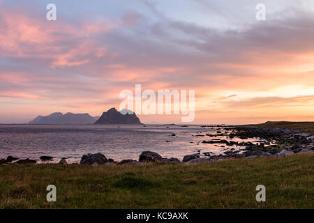 Scenic cloudscape with sunrise over the Lofoten islands in Norway in summer Stock Photo