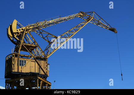 BUENOS AIRES, ARGENTINA, DECEMBER 22, 2013 : Crane in Puerto Madero new district. Also known as the Puerto Madero Waterfront, it occupies a significan Stock Photo