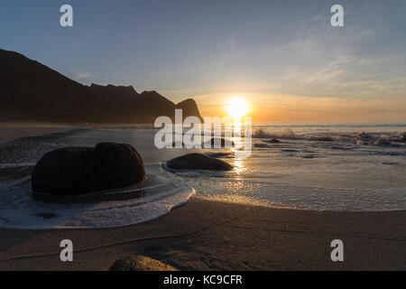 Sunset at Unstad Beach, the surfers paradise in Lofoten Islands, Norway Stock Photo