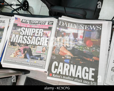 Front pages of New York newspapers on Tuesday, October 3, 2017 report on the shooting by Stephen Paddock in Las Vegas from his room at the Mandalay Bay hotel during a country music concert which resulted in 59 fatalities so far and 527 injured.  The shooting was the worst mass murder in US history. (© Richard B. Levine) Stock Photo