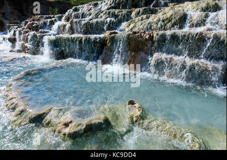 Natural spa with waterfalls  and hot springs at Saturnia thermal baths, Grosseto, Tuscany, Italy Stock Photo