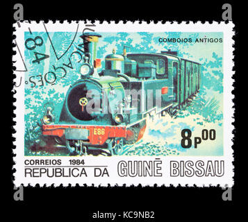 Postage stamp from Guinea-Bissau depicting a Kessler 2-6-OT steam locomotive from 1886. Stock Photo