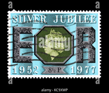Postage stamp from Great Britain depicting Queen Elizabeth, for her silver jubilee in 1977 Stock Photo