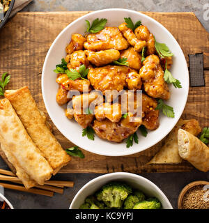 Spicy sweet and sour chicken with rice and cabbage Stock Photo