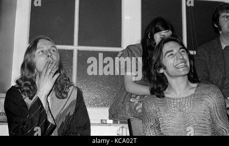 The Incredible String Band:  Founding members Robin Williamson (left) and Mike Heron backstage with their pyschedelic folk band band at the Colston Hall, Bristol, on 1 March 1969.  In the background is fellow band member Rose Simpson. Stock Photo