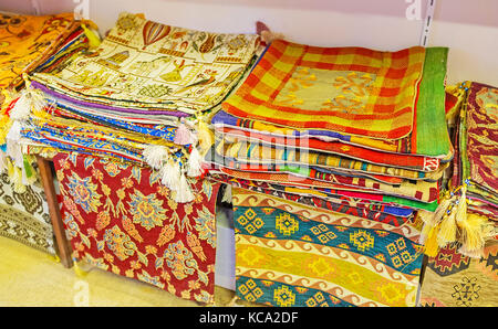 Decorative pillowslips are popular goods in Antalya market, the Ottoman style of interior design includes many cozy pillows on sofas, beds and chairs, Stock Photo