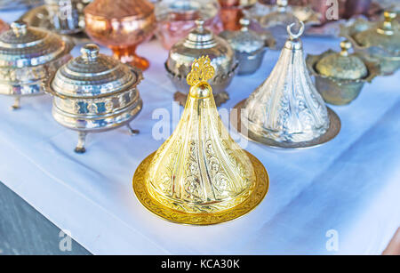 The stall of metalwork market in Antalya offers wide range of Turkish Delight serving dishes, steel and copper sugar bowls, other traditional Turkish  Stock Photo