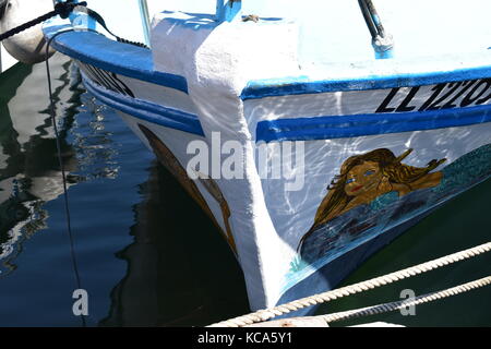 Paphos harbour on the Mediterranean island of Cyprus. Close up of fishing boat's paintwork. Stock Photo