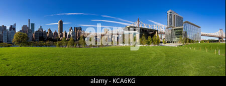 Summer panoramic view of the Cornell Tech campus on Roosevelt Island with the Queensboro Bridge. New York City Stock Photo