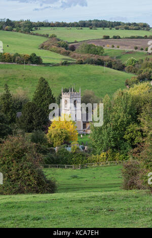 St Andrew’s church in autumn, Naunton, Cotswolds, Gloucestershire, England Stock Photo