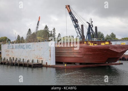 Sault Ste Marie, Michigan - A barge in a dry dock on the St. Mary's River. Stock Photo