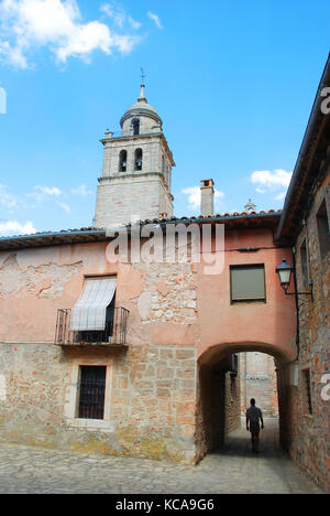 Street and tower of the collegiate church. Medinaceli, Soria province, Castilla Leon, Spain. Stock Photo