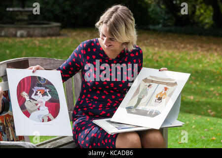 Bromley, UK. 3rd October, 2017. Auctioneer Catherine Southon poses with cartoons by Smilby (Francis Wilford-Smith, 1927-2009), one of the most successful cartoonists of his day and best known for his work for Playboy and Punch. Part 1 of the Smilby Cartoon Collection will be auctioned by Catherine Southon Auctioneers & Valuers on 1st November 2017. Credit: Mark Kerrison/Alamy Live News Stock Photo