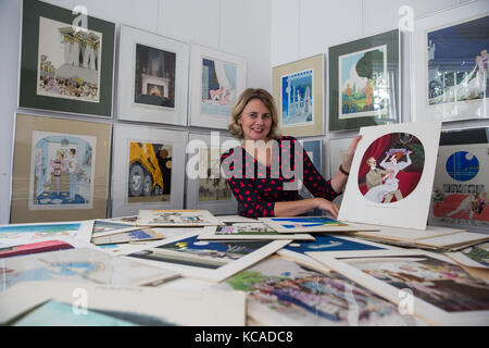 Bromley, UK. 3rd October, 2017. Auctioneer Catherine Southon poses with cartoons by Smilby (Francis Wilford-Smith, 1927-2009), one of the most successful cartoonists of his day and best known for his work for Playboy and Punch. Part 1 of the Smilby Cartoon Collection will be auctioned by Catherine Southon Auctioneers & Valuers on 1st November 2017. Credit: Mark Kerrison/Alamy Live News Stock Photo