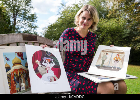 Bromley, UK. 3rd October, 2017. Auctioneer Catherine Southon poses with cartoons by Smilby (Francis Wilford-Smith, 1927-2009), one of the most successful cartoonists of his day and best known for his work for Playboy and Punch. Part 1 of the Smilby Cartoon Collection will be auctioned by Catherine Southon Auctioneers & Valuers on 1st November 2017. Credit: Mark Kerrison/Alamy Live News Stock Photo