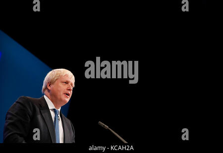 Manchester, UK. 3rd Oct, 2017. British Foreign Secretary Boris Johnson delivers his keynote speech at the Conservative Party's annual conference in Manchester, UK, on Oct. 3, 2017. The Conservative Party's annual conference is held here from Oct. 1 to Oct. 4. Credit: Han Yan/Xinhua/Alamy Live News Stock Photo