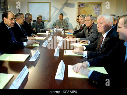 Al Asad, Iraq - September 3, 2007 -- United States President George W. Bush, Secretary of Defense Robert M. Gates, National Security Advisor Steve Hadley, U.S. Ambassador to Iraq Ryan Crocker, and Secretary of State Condolezza Rice, meet with Iraqi President Jalal Talabani and Prime Minister Nouri al Makili and other high ranking Iraqi Government officials at Al Asad Air Base, Iraq, Monday, September 3, 2007. Credit: Cherie A. Thurlby - DoD via CNP /MediaPunch Stock Photo