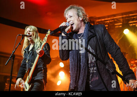 Wartenberg, Germany. 3rd October, 2017. Edguy, German Power Metal Band around singer Tobias Sammet. Final concert of their '25 Years - The Best of the Best Monuments 2017'-Tour at Wartenberg-Oval, Wartenberg-Angersbach, Germany. Here Tobias 'Eggi' Exxel (L, guitar) and Tobias Sammet (R, vocals). Credit: Christian Lademann Stock Photo