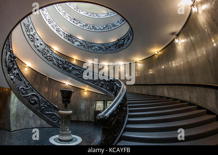 The Bramante Staircase, a double helix spiral staircase in the Vatican Museum in Rome. Stock Photo