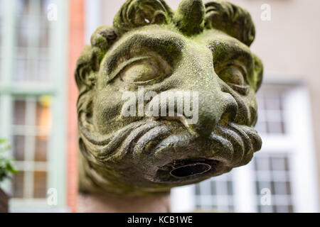 Ornaments, mouldings, gargoyle, low reliefs in a sandstone, granite, concrete. sculpting details in Gdansk (Danzig).  Mariacka street (Mariengasse) an Stock Photo