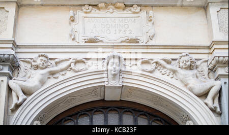 Ornaments, mouldings, gargoyle, low reliefs in a sandstone, granite, concrete. sculpting details in Gdansk (Danzig).  Mariacka street (Mariengasse) an Stock Photo