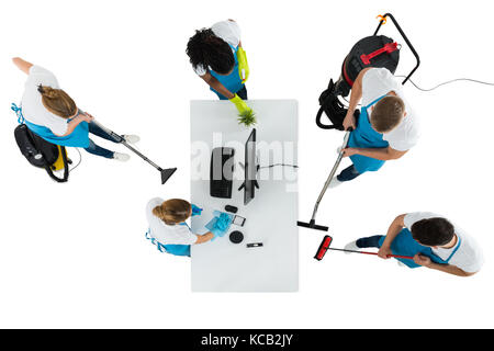 High Angle View Of Janitors Cleaning Office On White Background Stock Photo