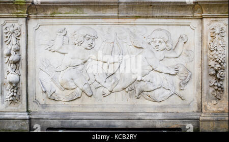 Ornaments, mouldings, gargoyle, low reliefs in a sandstone, granite, concrete. sculpting details in Gdansk (Danzig).  Mariacka street (Mariengasse) an Stock Photo